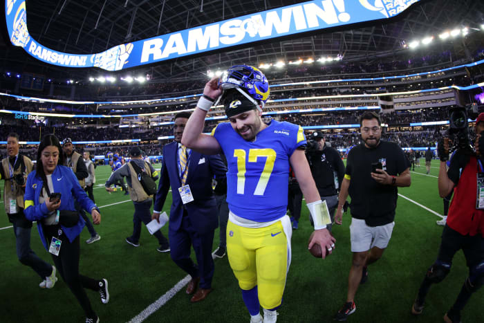 Baker Mayfield walks off the field.