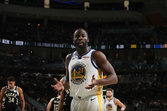 MILWAUKEE, WI - DECEMBER 13: Draymond Green #23 of the Golden State Warriors looks on during the game against the Milwaukee Bucks on December 13, 2022 at the Fiserv Forum Center in Milwaukee, Wisconsin. (Photo by Gary Dineen/NBAE via Getty Images).