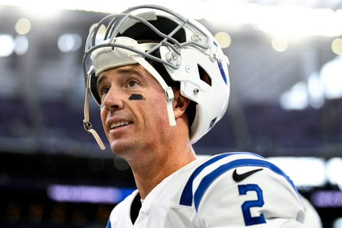 Matt Ryan looks on.