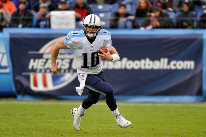Jake Locker running with the football.