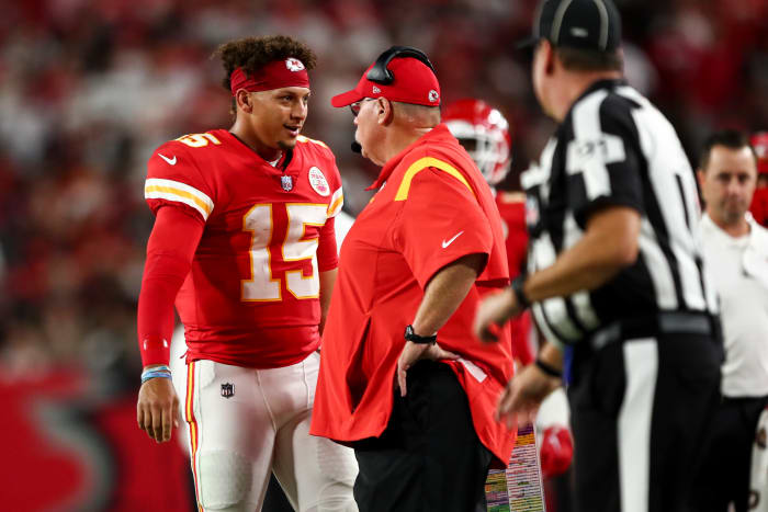 TAMPA, FL - OCTOBER 2: Patrick Mahomes #15 of the Kansas City Chiefs talks with head coach Andy Reid during an NFL football game against the Tampa Bay Buccaneers at Raymond James Stadium on October 2, 2022 in Tampa, Florida. (Photo by Kevin Sabitus/Getty Images)