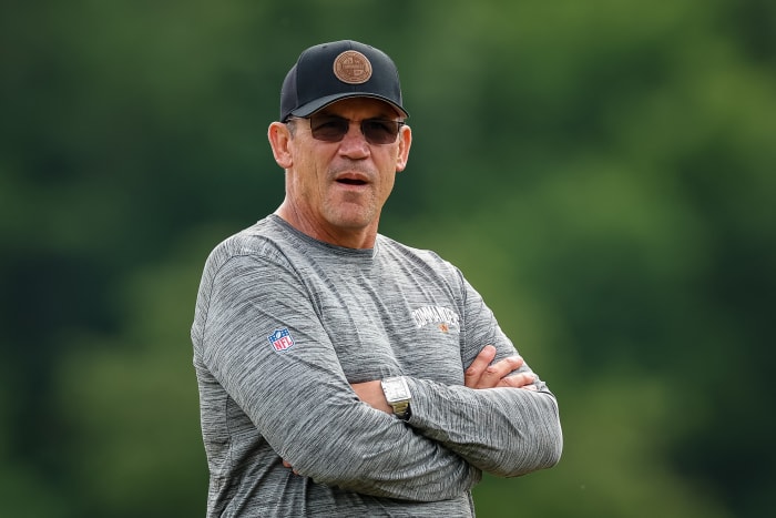 Washington Commanders head coach Ron Rivera looks on at practice.