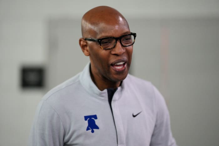 A closeup shot of 76ers assistant coach Sam Cassell.