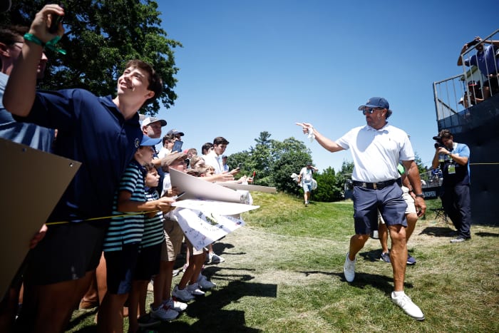 BROOKLINE, MASSACHUSETTS - JUNE 15: Phil Mickelson of the United States walks by fans to the 18th hole during a practice round prior to the 122nd U.S. Open Championship at The Country Club on June 15, 2022 in Brookline, Massachusetts. (Photo by Jared C. Tilton/Getty Images)