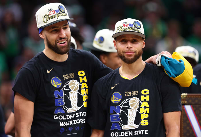 BOSTON, MASSACHUSETTS - JUNE 16: Stephen Curry #30 and Klay Thompson #11 of the Golden State Warriors celebrate after defeating the Boston Celtics 103-90 in Game Six of the 2022 NBA Finals at TD Garden on June 16, 2022 in Boston, Massachusetts. NOTE TO USER: User expressly acknowledges and agrees that, by downloading and/or using this photograph, User is consenting to the terms and conditions of the Getty Images License Agreement. (Photo by Elsa/Getty Images)