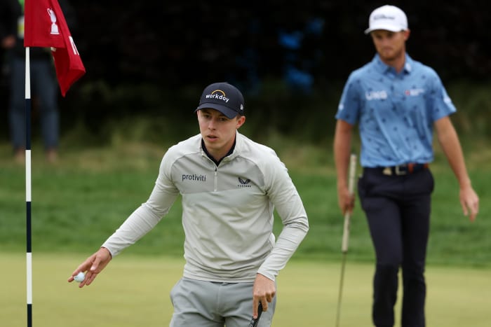 BROOKLINE, MASSACHUSETTS - JUNE 19: (L-R) Matt Fitzpatrick of England waves on the fifth green as Will Zalatoris of the United States looks on during the final round of the 122nd U.S. Open Championship at The Country Club on June 19, 2022 in Brookline, Massachusetts. (Photo by Patrick Smith/Getty Images)