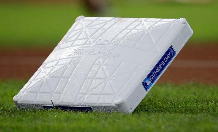 HOUSTON, TEXAS - JUNE 20: Father's Day is commemorated on the base pads as the Chicago White Sox play the Houston Astros at Minute Maid Park on June 20, 2021 in Houston, Texas. (Photo by Bob Levey/Getty Images)