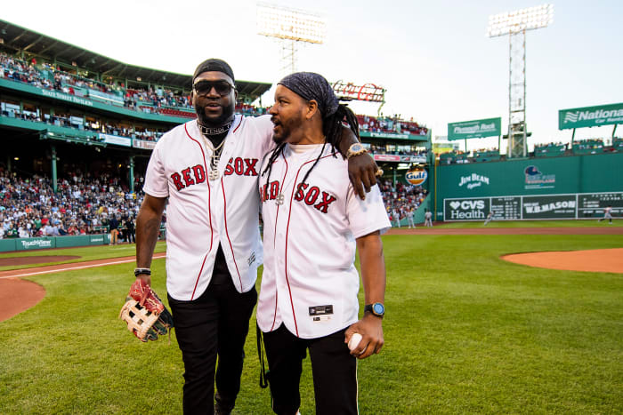 BOSTON, MA - JUNE 20: Former left fielder Manny Ramirez of the Boston Red Sox reacts with former designated hitter David Ortiz after being presented with his Boston Red Sox Hall of Fame plaque during a pre-game ceremony before a game against the Detroit Tigers on June 20, 2022 at Fenway Park in Boston, Massachusetts.  (Photo by Billie Weiss/Boston Red Sox/Getty Images)