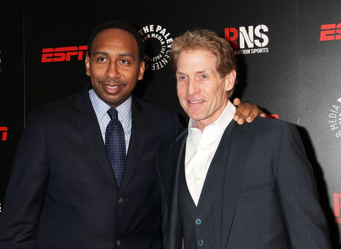 Stephen A. Smith and Skip Bayless at a 2014 Media Dinner.