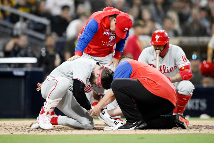 SAN DIEGO, CA - JUNE 25: Bryce Harper #3 of the Philadelphia Phillies is looked at after being hit with a pitch during the fourth inning of a baseball game against the San Diego Padres June 25, 2022 at Petco Park in San Diego, California. (Photo by Denis Poroy/Getty Images)