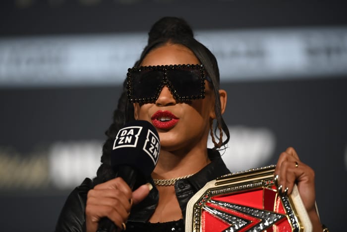 WWE star Bianca Belair speaks at a press conference.