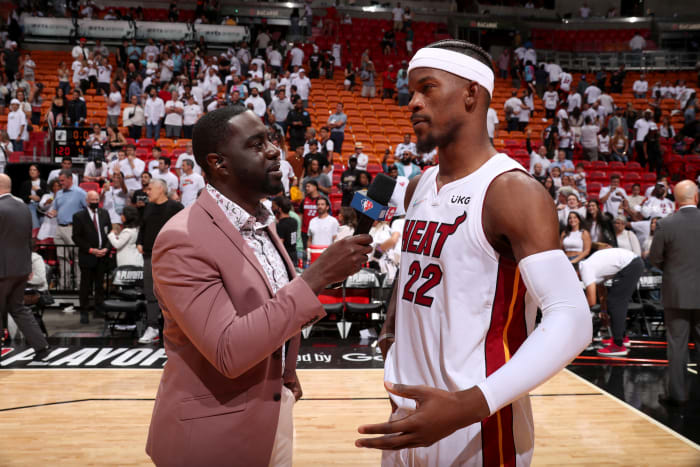 TNT's Chris Haynes interviews Jimmy Butler of the Miami Heat after a game.