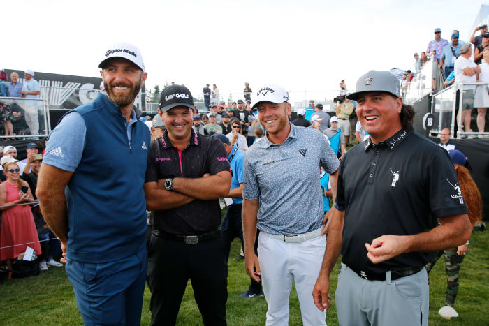 NORTH PLAINS, OREGON - JULY 02: (L-R) Team Captain Dustin Johnson, Patrick Reed, Talor Gooch and Pat Perez of 4 Aces GC smile on the 18th green after winning the team competition during day three of the LIV Golf Invitational - Portland at Pumpkin Ridge Golf Club on July 02, 2022 in North Plains, Oregon. (Photo by Jonathan Ferrey/LIV Golf via Getty Images)