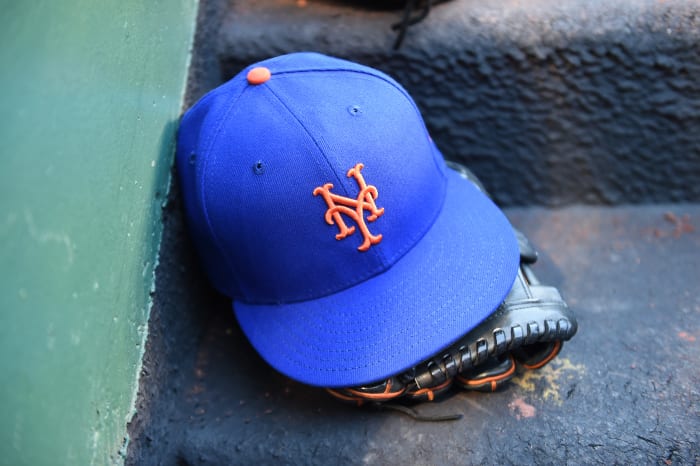 WASHINGTON DC - MAY 10: New York Mets baseball caps on the steps of the dugout before a game against the Washington Nationals at Nationals Park in Washington, DC on May 10, 2022. (via G Fiume/Getty Images) photograph)