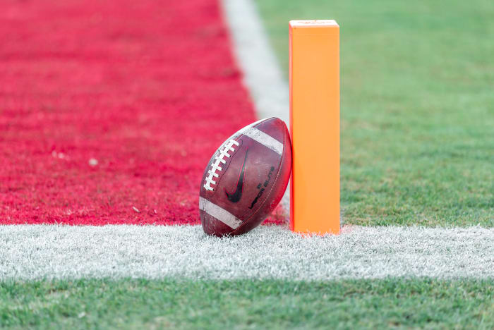 PALO ALTO, CA - NOVEMBER 27: Close-up view of an American football propped up on the goal line marker on the field at Stanford Stadium before an NCAA football game between the Notre Dame Fighting Irish and the Stanford Cardinal on November 27, 2021 in Palo Alto, California.  (Photo by David Madison/Getty Images)
