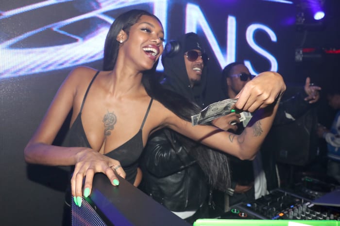 Jessica White attending the SINS with Nick Cannon.