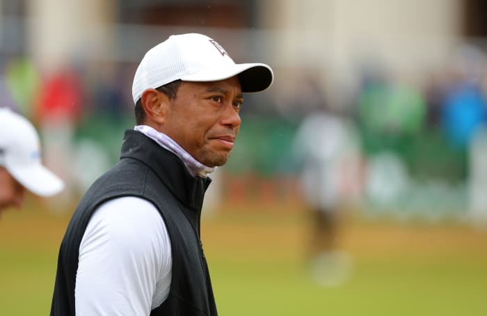 ST ANDREWS, SCOTLAND - JULY 15: Tiger Woods of the United States looks on on the 1st hole during Day Two of The 150th Open at St Andrews Old Course on July 15, 2022 in St Andrews, Scotland.  (Photo by Kevin C. Cox/Getty Images)