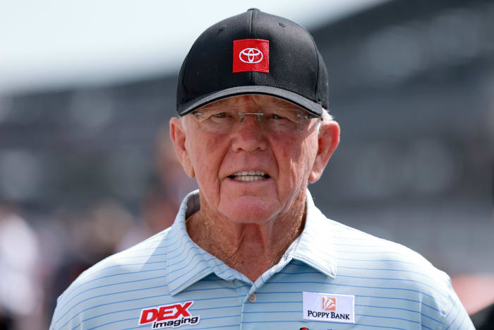 NASCAR Hall of Famer and owner Joe Gibbs walks out on the track.