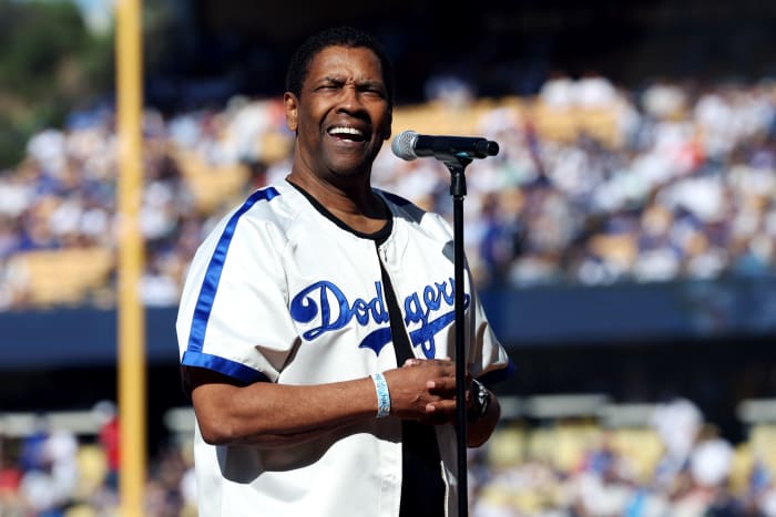 LOS ANGELES, CA - JULY 19: Denzel Washington leads a tribute to Jackie Robinson prior to the 92nd MLB All-Star Game presented by Mastercard at Dodger Stadium on Tuesday, July 19, 2022 in Los Angeles, California. (Photo by Mary DeCicco/MLB Photos via Getty Images)
