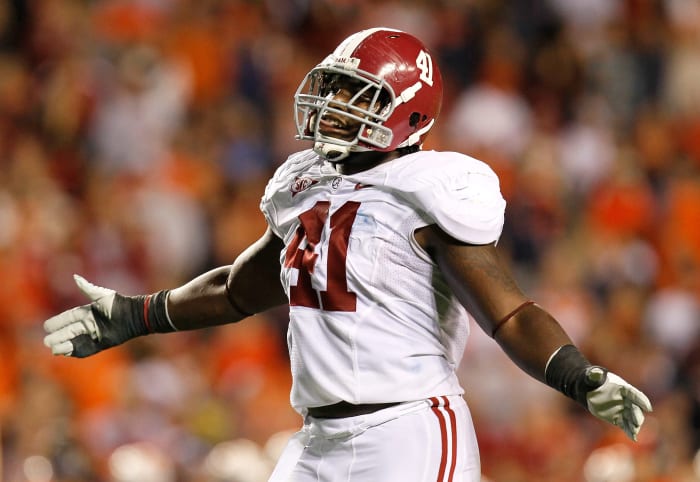 AUBURN, AL - NOVEMBER 26: Courtney Upshaw #41 of the Alabama Crimson Tide reacts after a defensive stop against the Auburn Tigers at Jordan-Hare Stadium on November 26, 2011 in Auburn, Alabama. (Photo by Kevin C. Cox/Getty Images)
