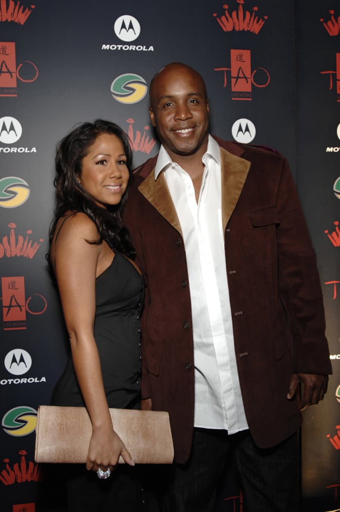 Barry Bonds and his second wife, Liz Watson, at a basketball event.