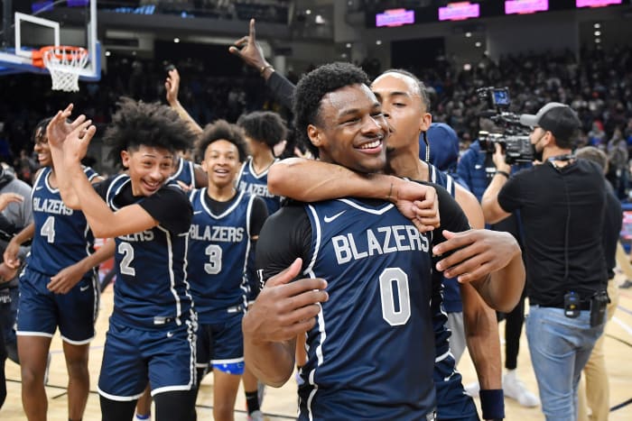 Bronny James and his high school teammates celebrate following a win in Chicago.
