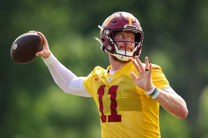 ASHBURN, VA - JUNE 16: Carson Wentz #11 of the Washington Commanders participates in a drill during the organized team activity at INOVA Sports Performance Center on June 16, 2022 in Ashburn, Virginia.  (Photo by Scott Taetsch/Getty Images)