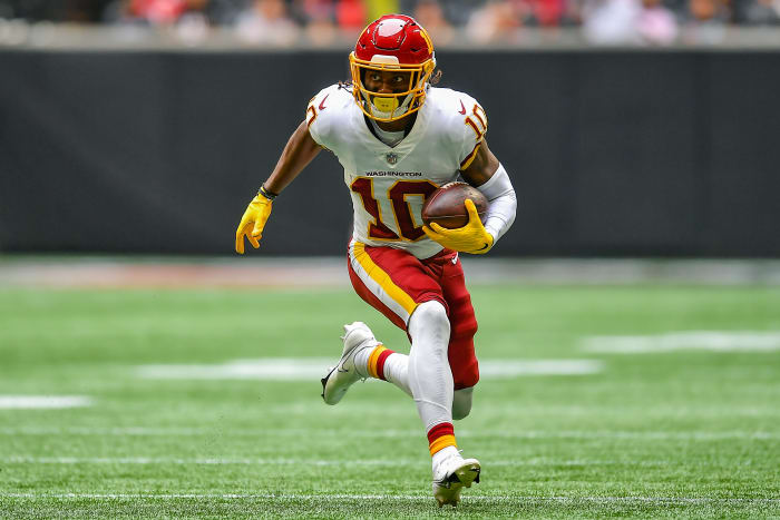 Washington wide receiver Curtis Samuel runs with the ball.