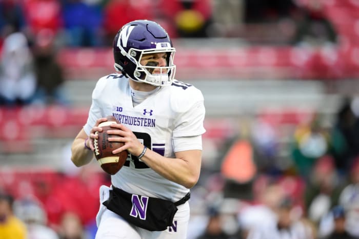 Ryan Hilinski drops back to pass for Northwestern.