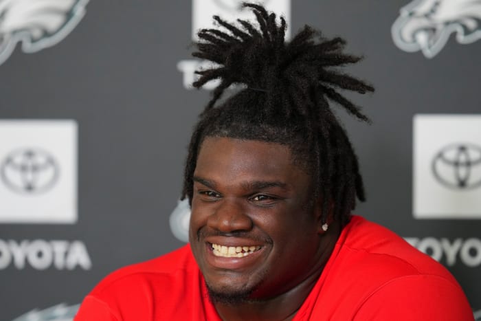 Eagles rookie Jordan Davis smiles during a media session at OTAs.