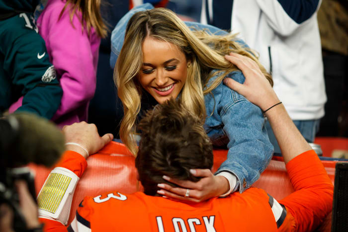 DENVER, CO - DECEMBER 22: Natalie Newman congratulates her boyfriend and quarterback Drew Lock #3 of the Denver Broncos after a game against the Detroit Lions at Empower Field at Mile High on December 22, 2019 in Denver, Colorado. The Broncos defeated the Lions 27-17. (Photo by Justin Edmonds/Getty Images)