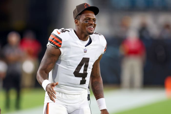 Deshaun Watson celebrates on the field with the Browns.