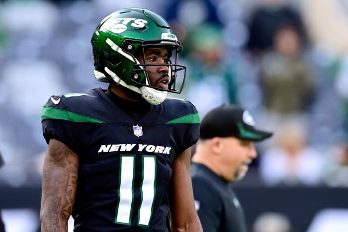 Denzel Mims warming up on the field for the New York Jets.