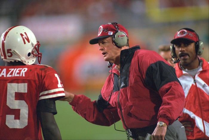 Former Nebraska football star Tommie Frazier on the sideline with Tom Osborne.