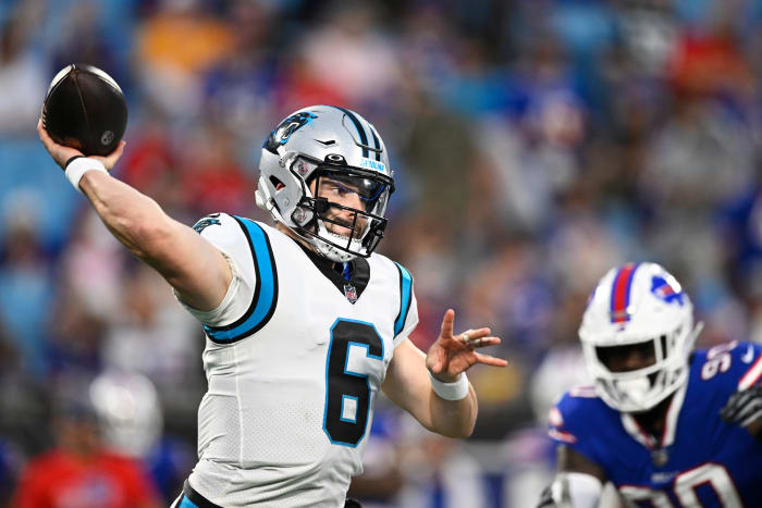 Baker Mayfield attempting a pass for the Carolina Panthers.