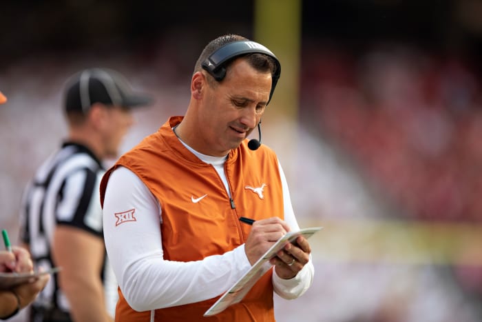 Steve Sarkisian of the Texas Longhorns on the sidelines during a game against the Arkansas Razorbacks.