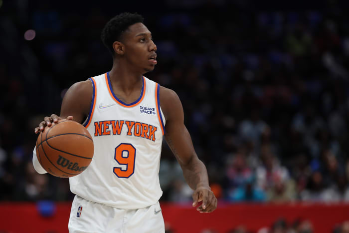 RJ Barrett dribbles the ball in a game.