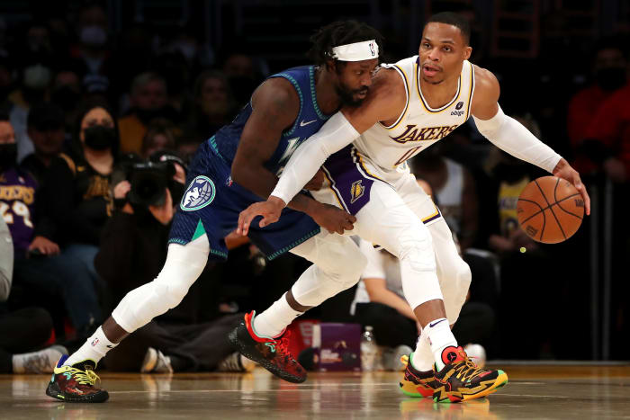 Patrick Beverley guards Russell Westbrook in a game.