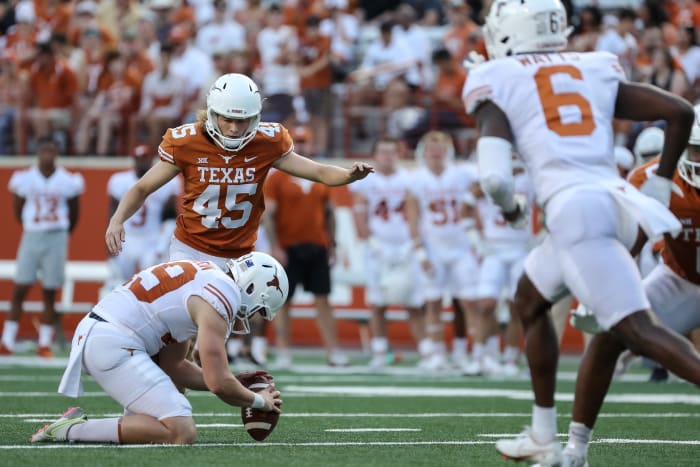 Bert Auburn kicking for the Texas Longhorns.