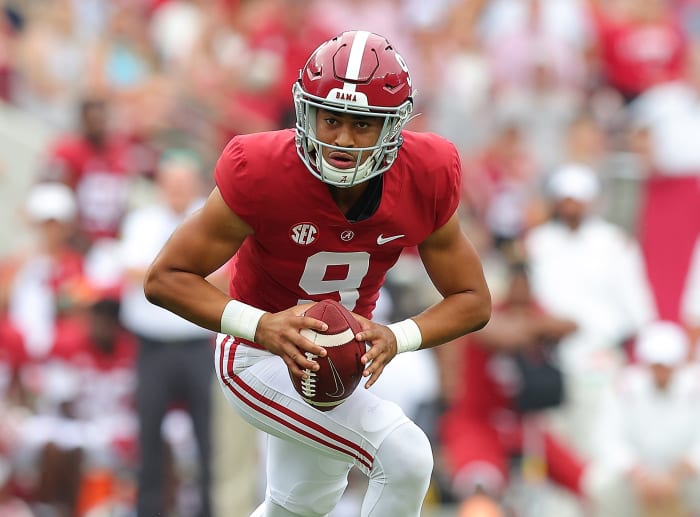 Bryce Young scrambles against Ole Miss.