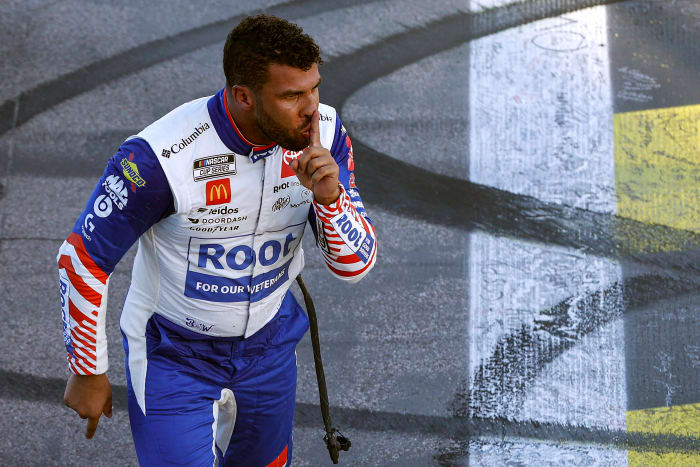 Bubba Wallace celebrates after winning in the Cup Series race on Sunday.