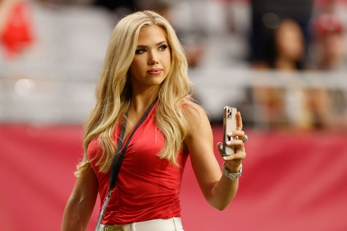 GLENDALE, AZ - AUGUST 20: Miss Kansas USA, Gracie Hunt, between the Kansas City Chiefs and the Arizona Cardinals at State Farm Stadium on August 20, 2021 in Glendale, Arizona Walking the field before an NFL preseason game. (Photo by Christian Petersen/Getty Images)