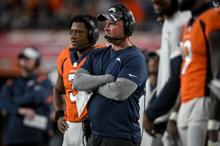 Nathaniel Hackett of the Denver Broncos and Russell Wilson