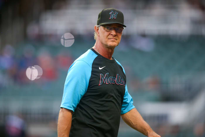 Manager Don Mattingly makes a pitching change for the Miami Marlins.