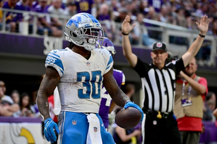 Jamaal Williams scores a touchdown.