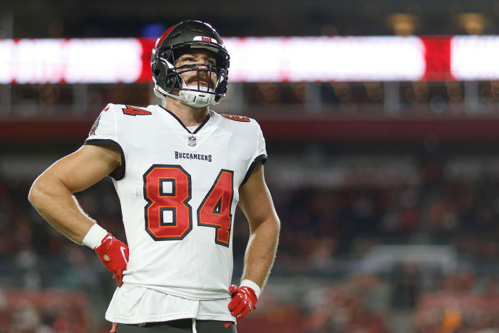 Tampa Bay Buccaneers tight end Cameron Brate stands with his hands on his hips during a game.