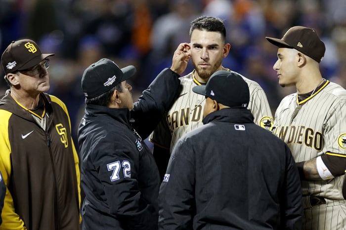 Padres pitcher Joe Musgrove getting checked for foreign substances.