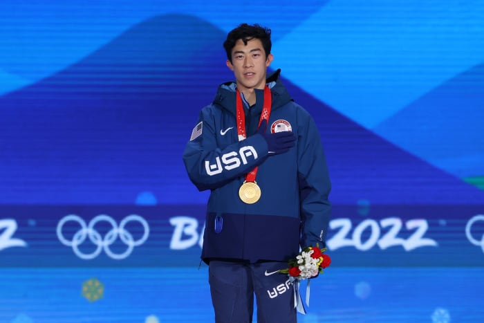 BEIJING, CHINA - FEBRUARY 10: Gold medallist Nathan Chen of Team United States celebrates during the Figure Skating Men Single Skating medal ceremony on Day 6 of the Beijing 2022 Winter Olympic Games at Beijing Medal Plaza on February 10, 2022 in Beijing, China. (Photo by Jean Catuffe/Getty Images)