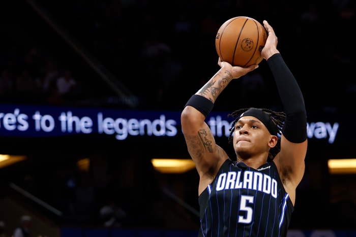Orlando Magic rookie Paolo Banchero shoots the ball against the Charlotte Hornets.