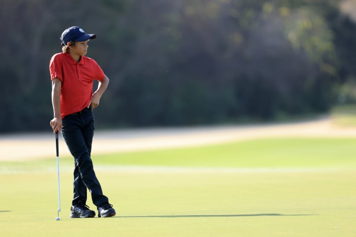 ORLANDO, FLORIDA - DECEMBER 19: Charlie Woods waits to play a shot on the 16th hole during the final round of the PNC Championship at the Ritz Carlton Golf Club Grande Lakes on December 19, 2021 in Orlando, Florida. (Photo by Sam Greenwood/Getty Images)
